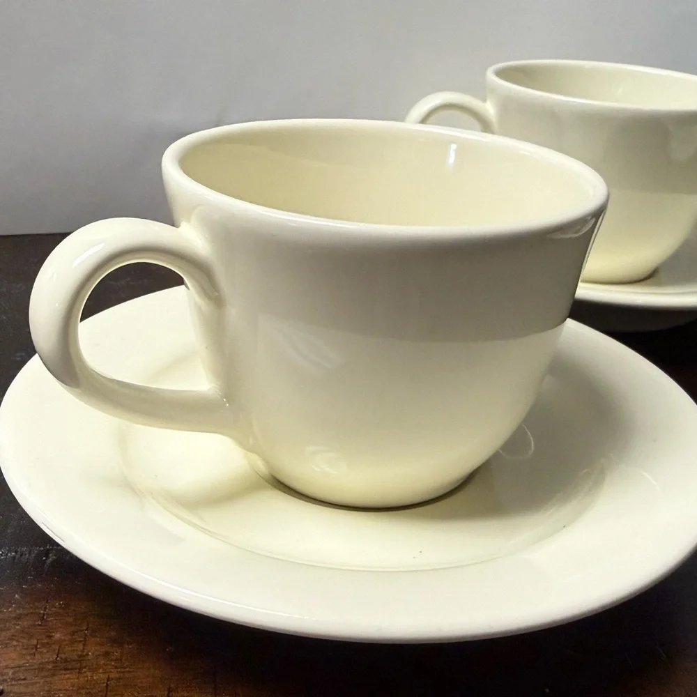 Williams Sonoma Belvedere Cream colored earthware flat cups and saucers